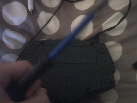 I always keep a screwdriver on my desk with my other essentials. Just for occasions like this. Also: I still can't operate a camera, hence the blurry-as-fuck screwdriver.